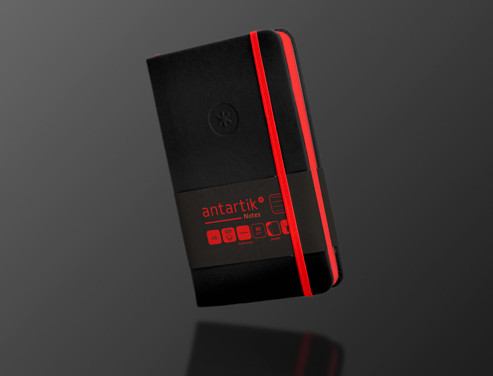 CADERNO COM ELASTICO ANTARTIK NOTES CAPA DURA A6 PAUTADO PRETO E VERMELHO 100 FOLHAS 80 GR FSC